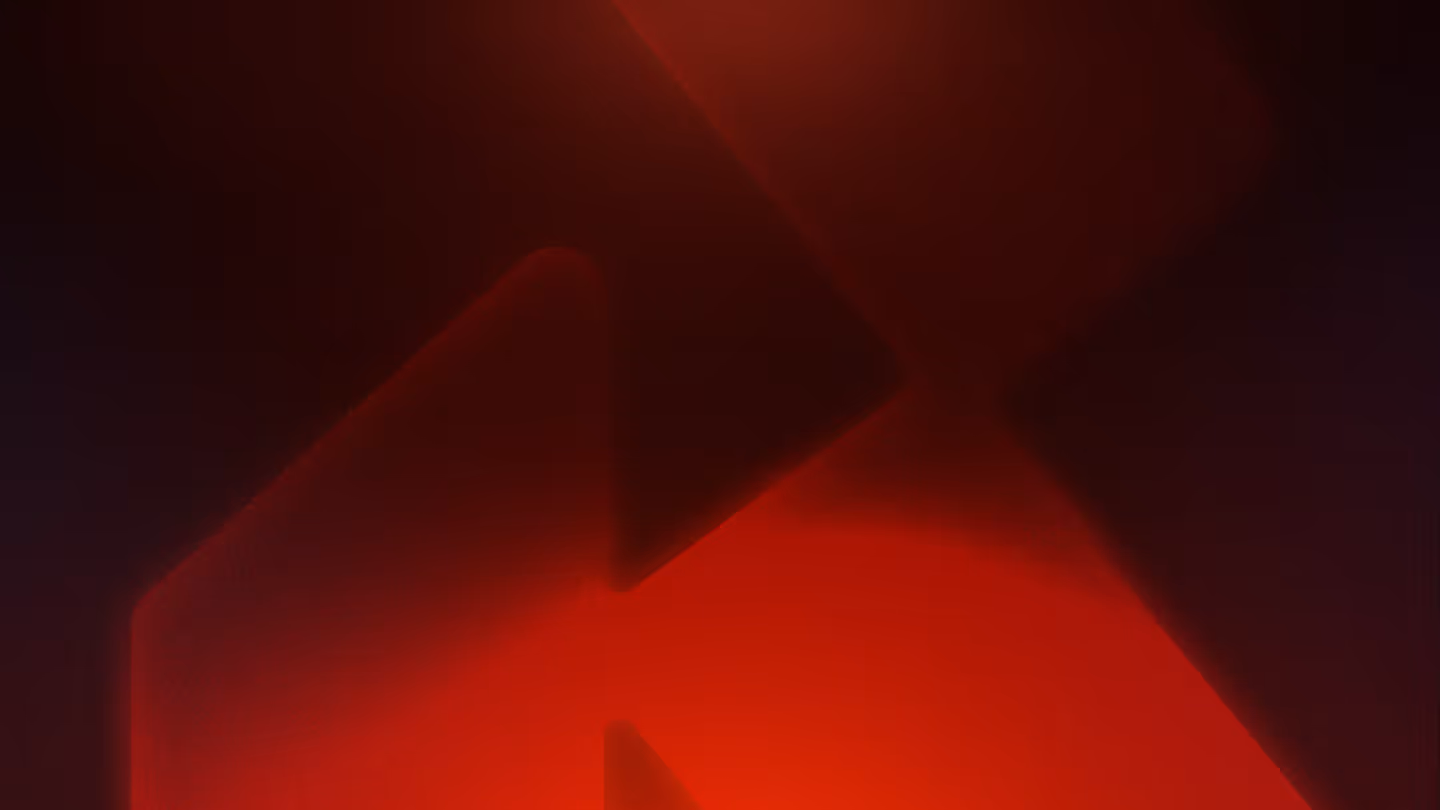 Abstract dark red and black gradient background with soft glowing shapes.
