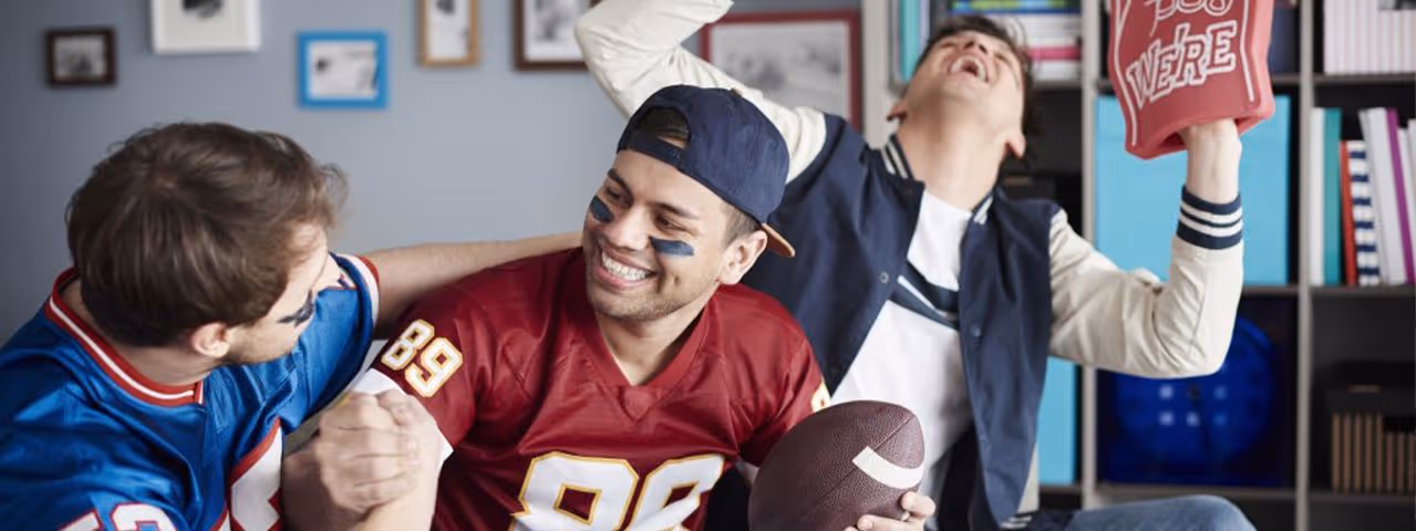 Sports fans celebrating.
