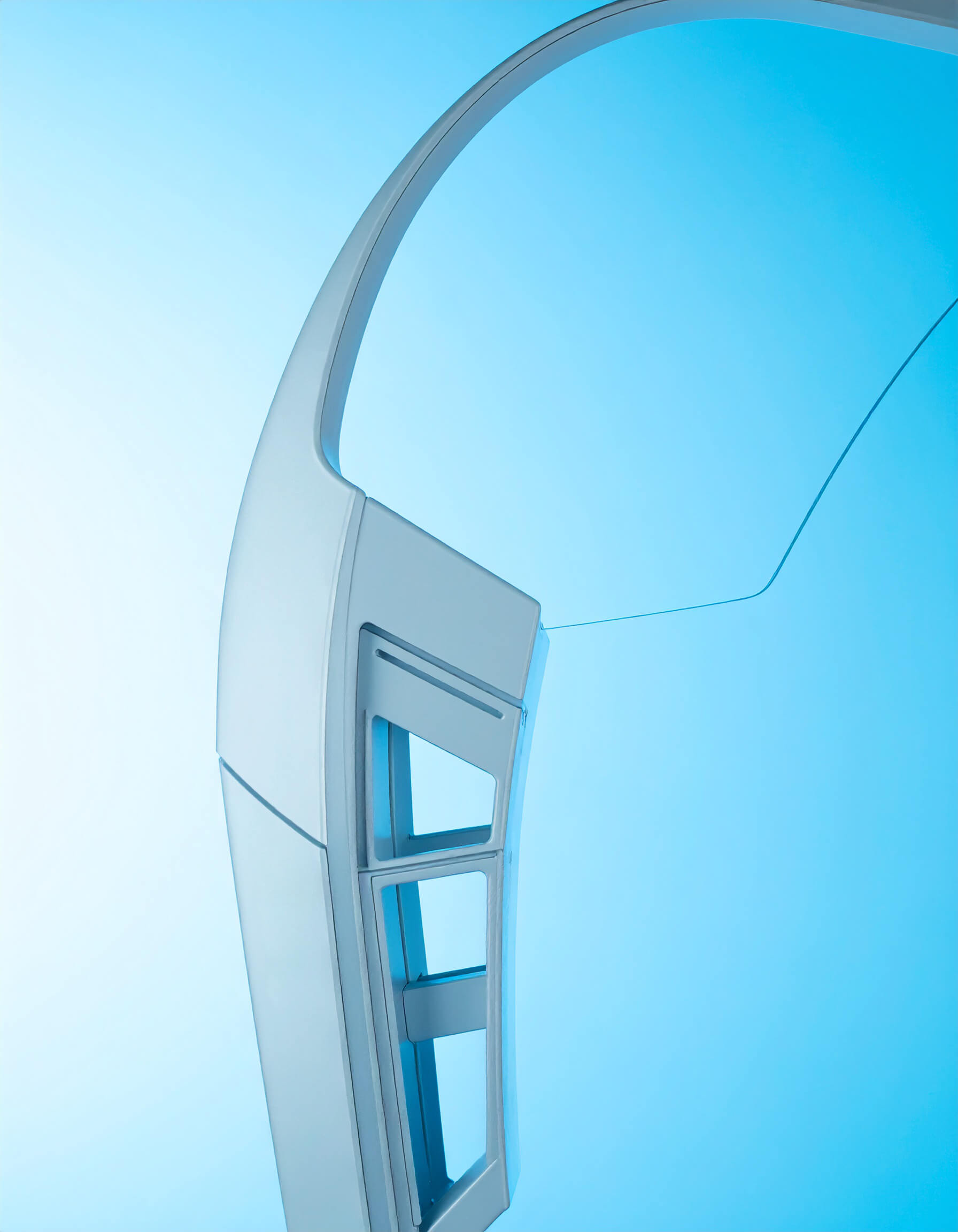 A product shot of a pair of sunglasses with a white frame on a blue background.