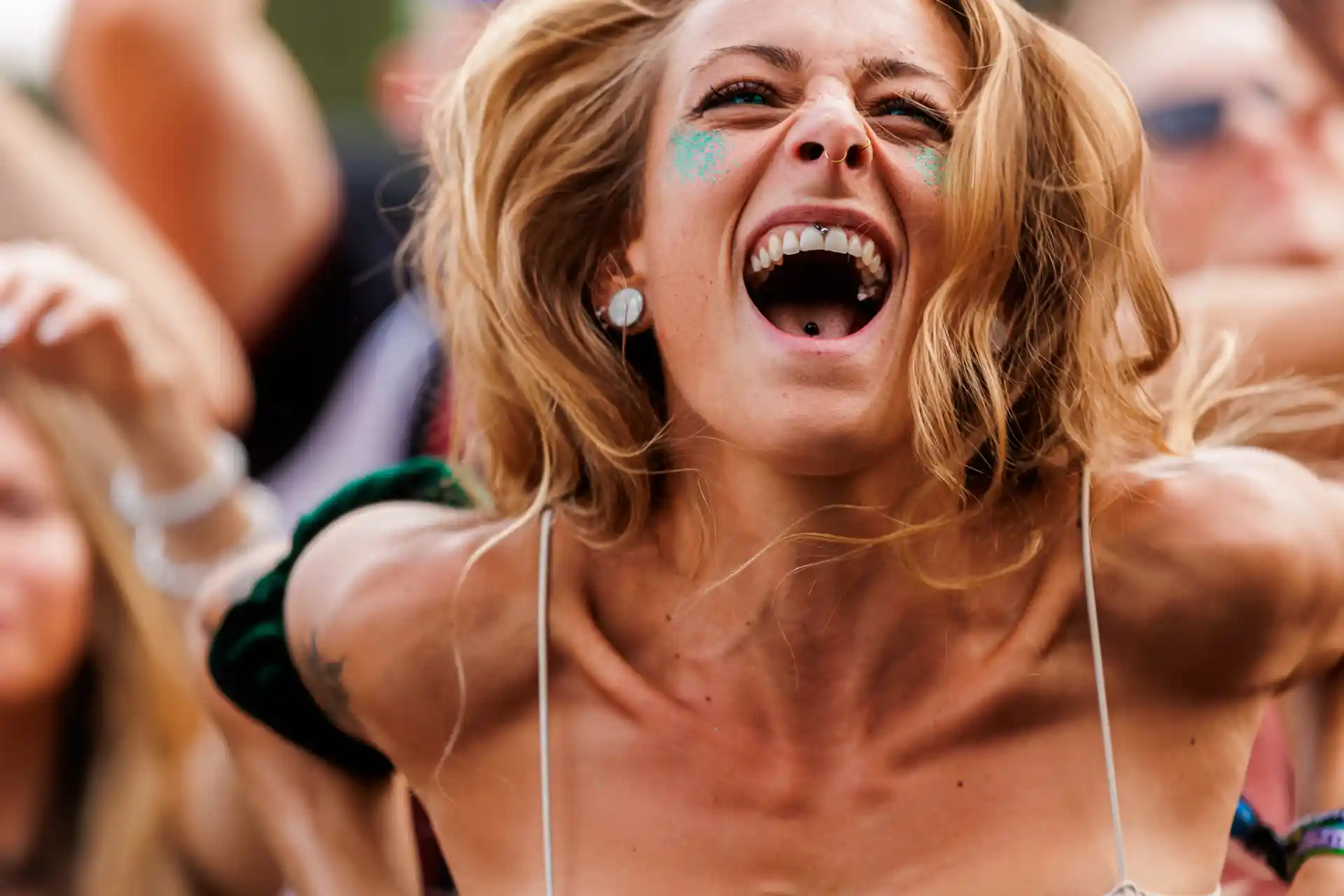 Decibel Outdoor music festival crowd member cheering with intense emotion