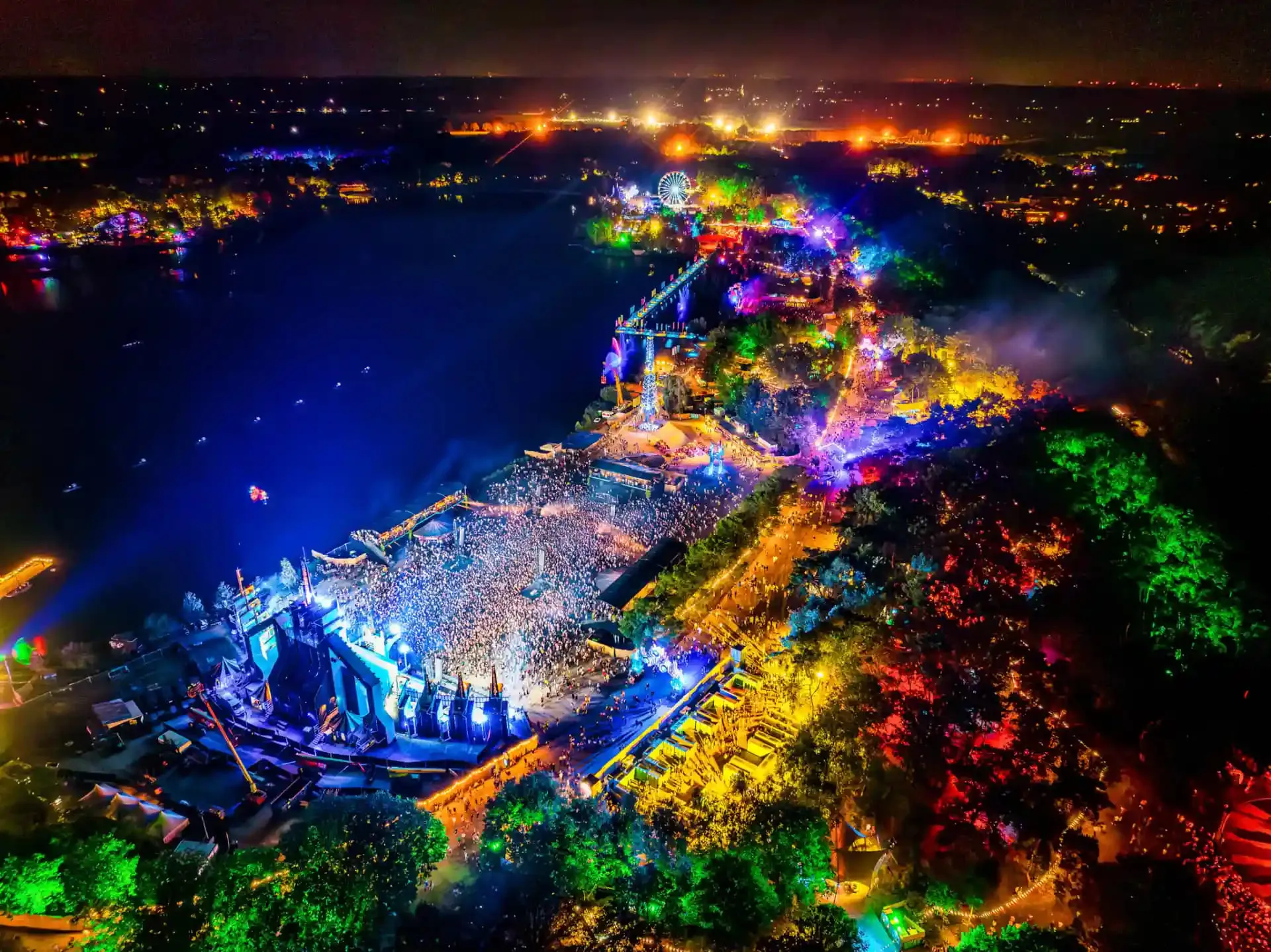 Decibel Outdoor Festival: Vibrant night aerial view of massive music event