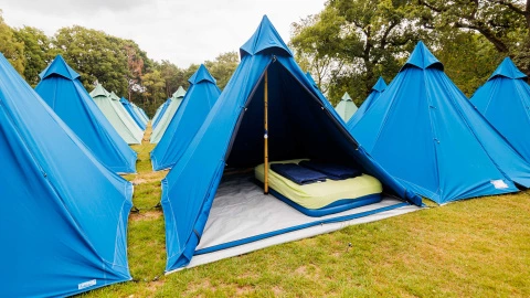 a blue plus tent