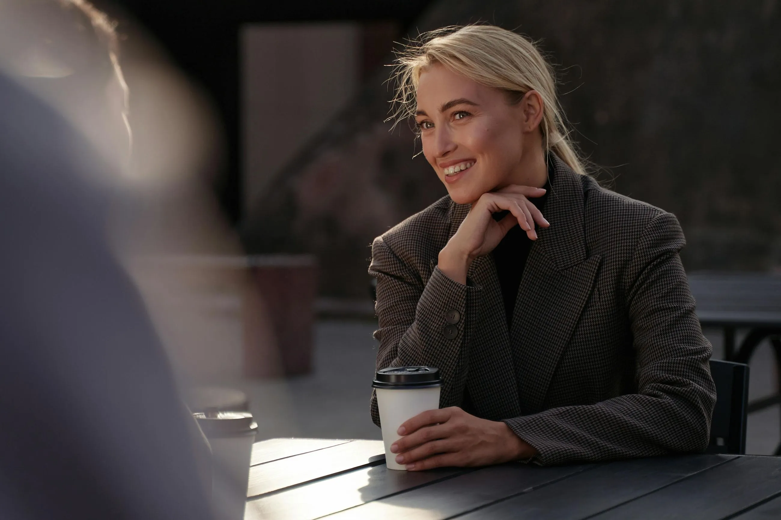 blonde woman doing conversation