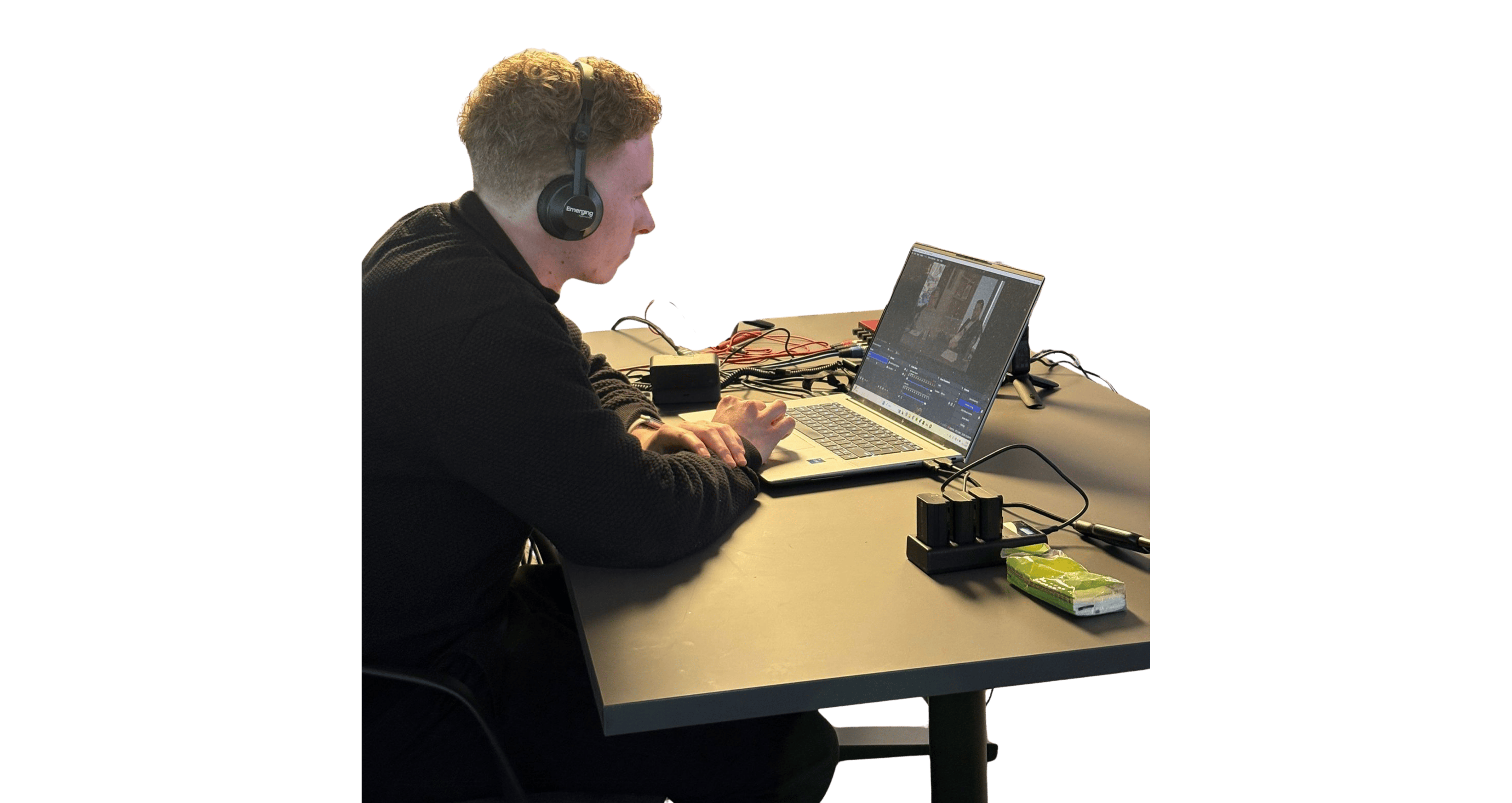 An EDP Director setting up a camera tripod