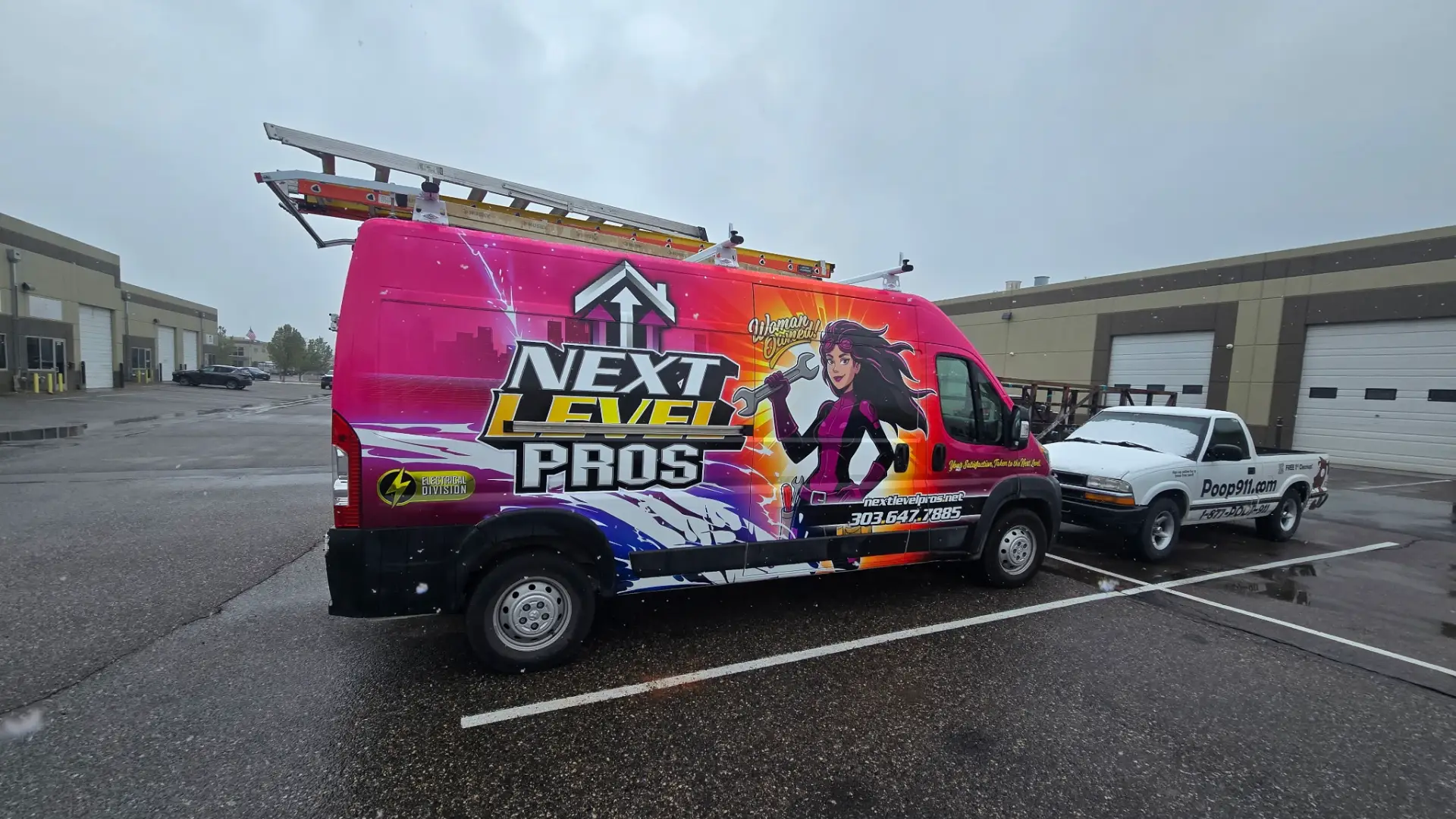 Next Level Pros service van with woman-owned logo