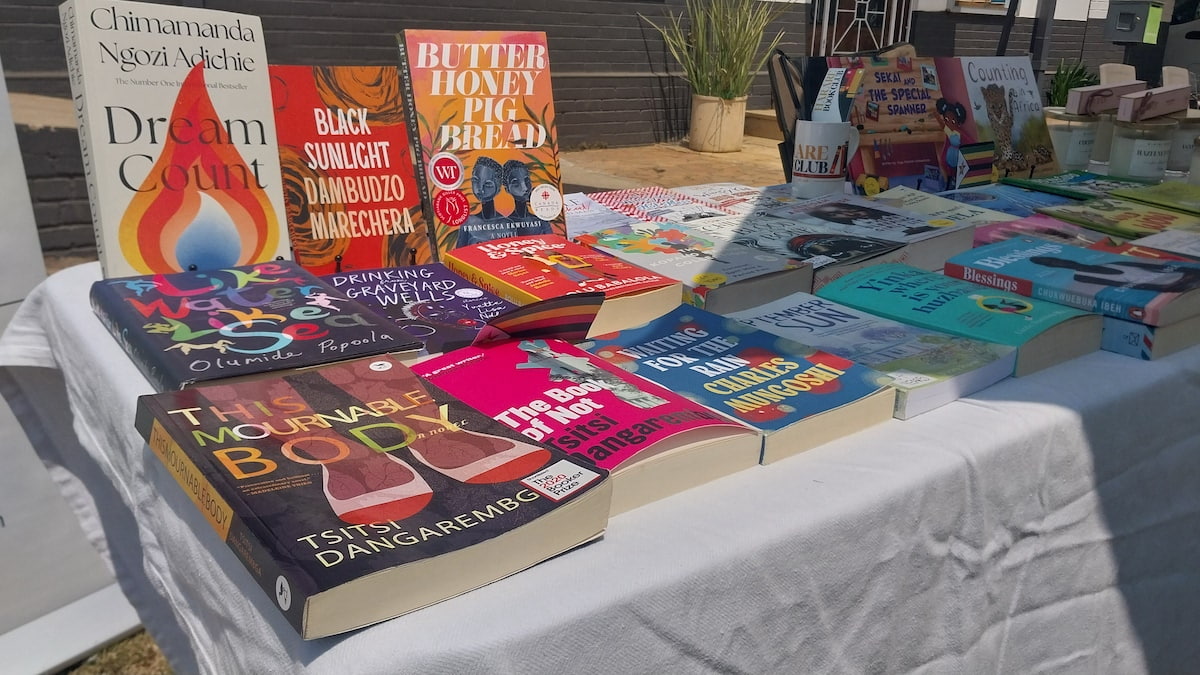 A variety of books and wares arranged on a table.