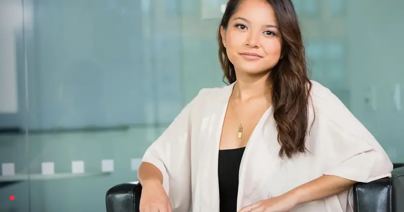 Payroll professional in a modern Danish office