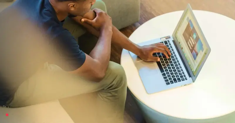 Founder working remotely while setting up a business in Denmark from abroad