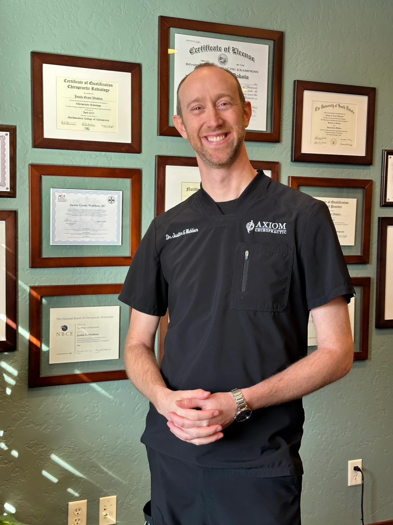 A headshot of Dr. Justin Wubben, D.C. and Clinical Director.
