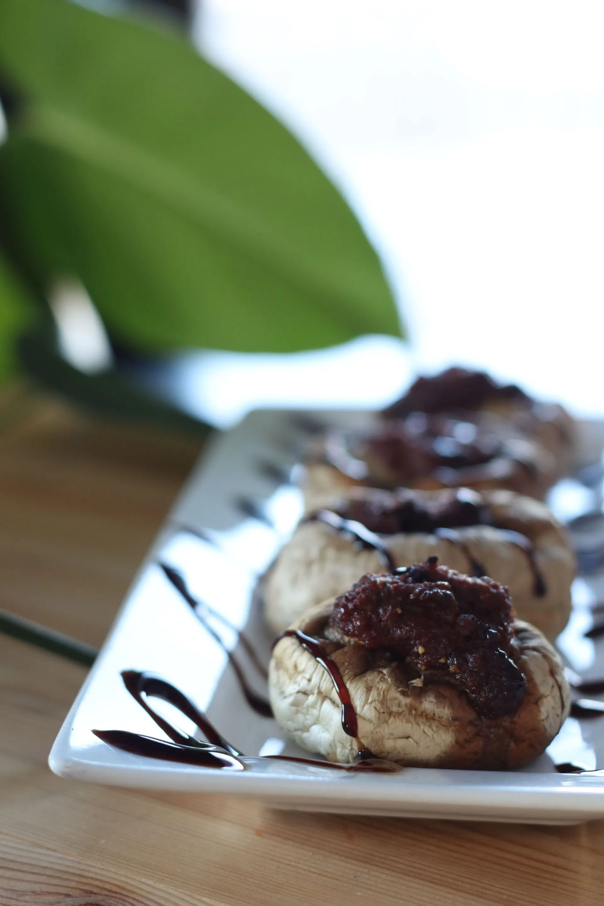 Order of button Mushrooms stuffed with cream cheese + seasoned pork sausage.