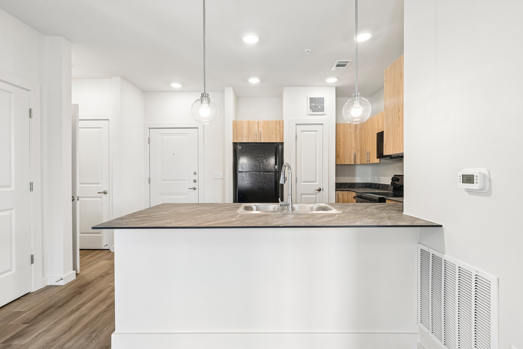 kitchen island with white walls