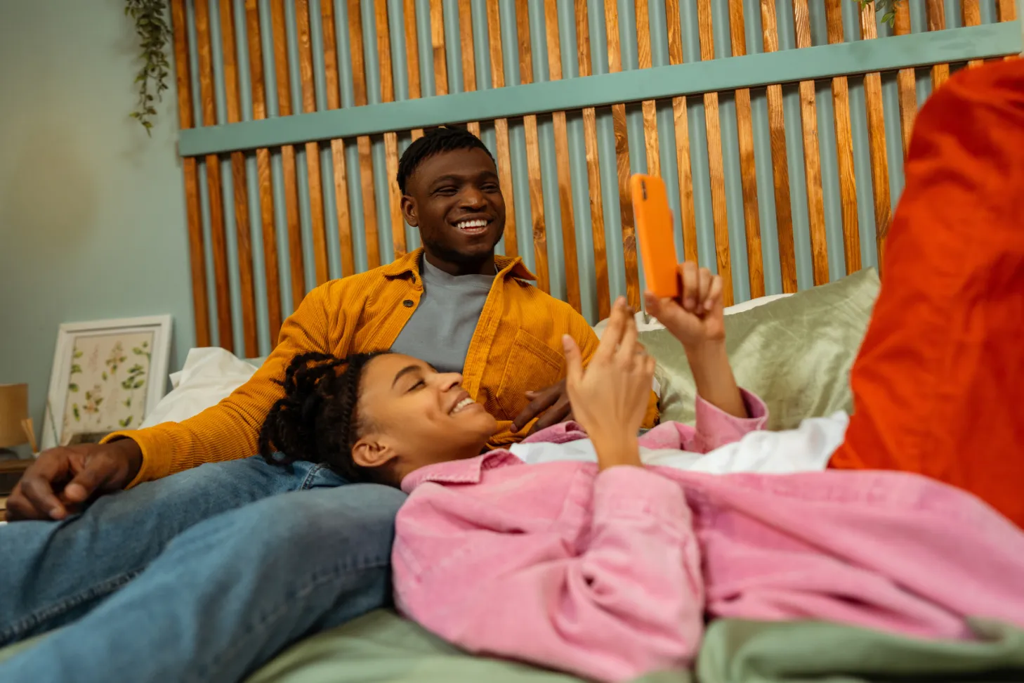 couple sitting on couch stock image