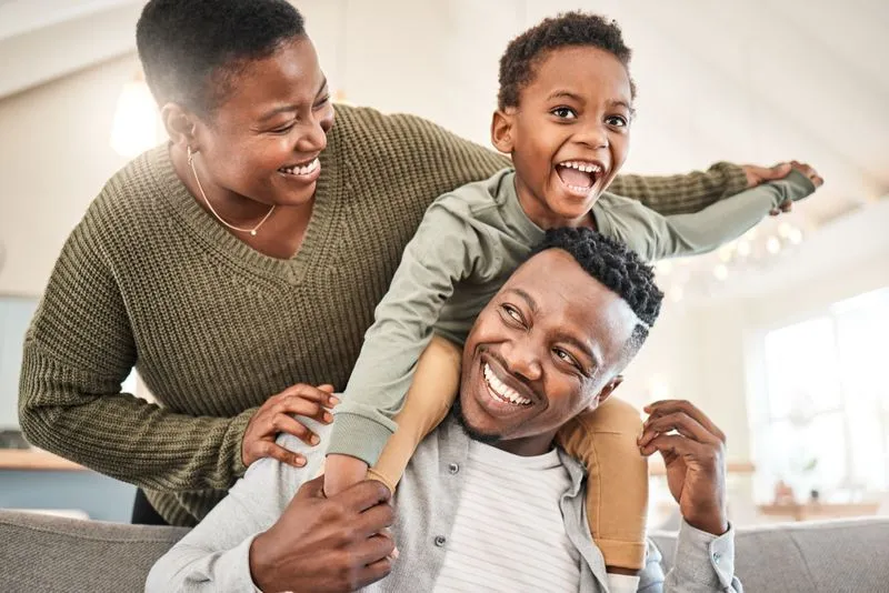 family playing stock image