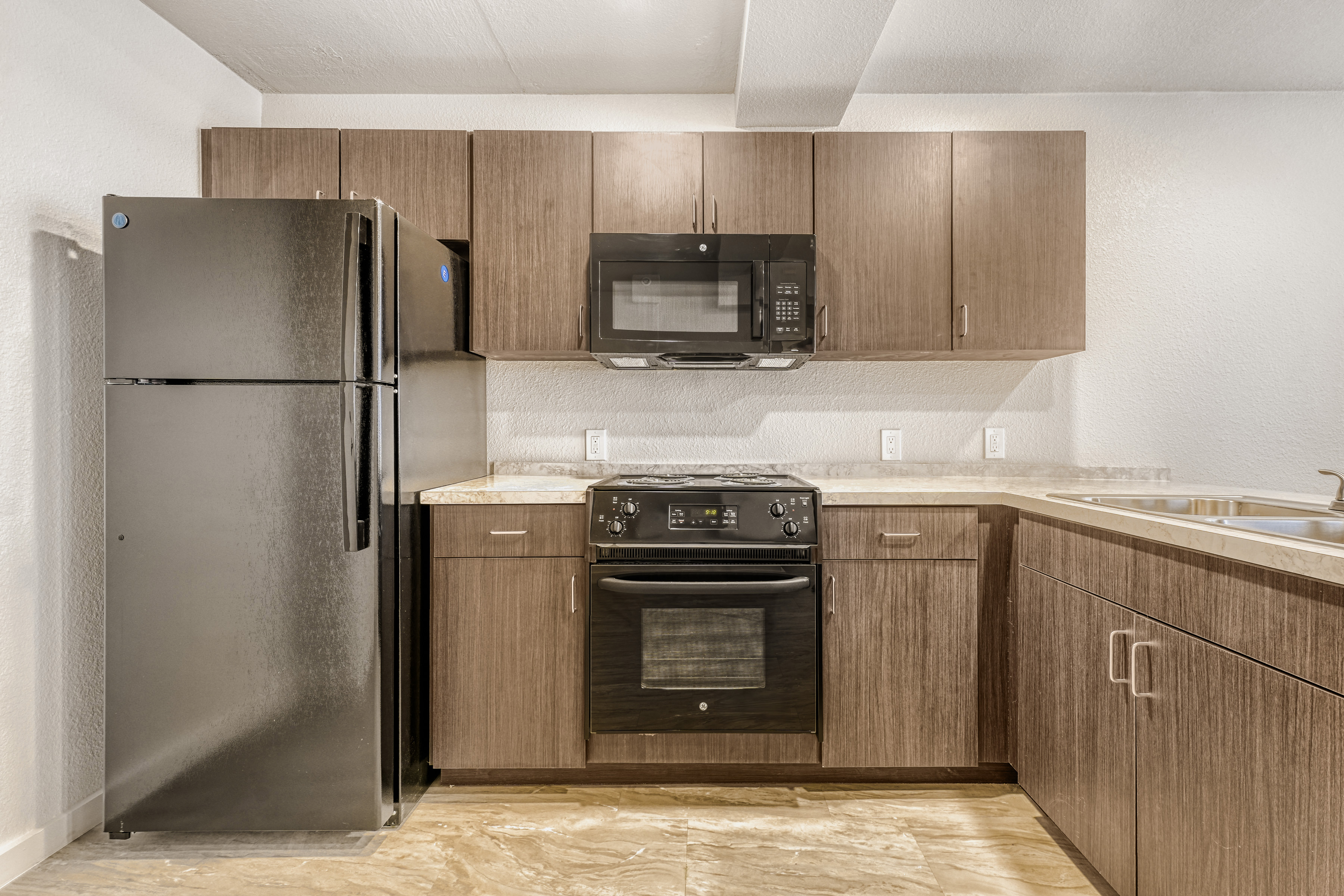 Kitchen with brown cabinets