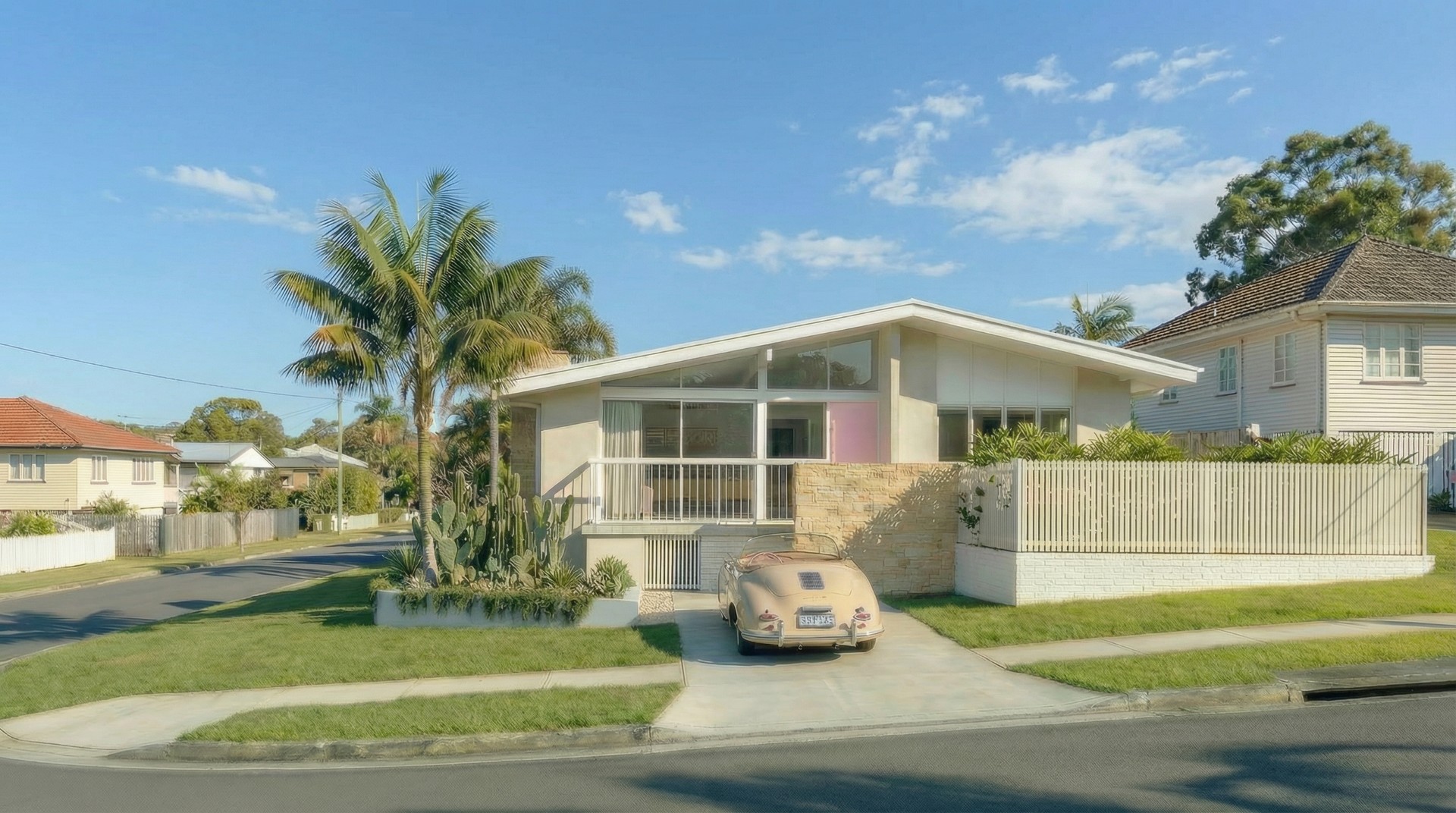 Palm springs inspired home Brisbane by Quorum Studios architects with flat roof, large glazing and climate-responsive subtropical architecture