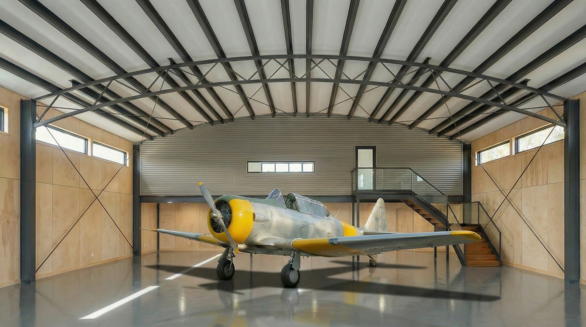 Unique hangar home interior by Brisbane residential architects Quorum Studios - open-plan living space barrel vault ceiling aviation enthusiast residence luxury airpark house Sunshine Coast architect