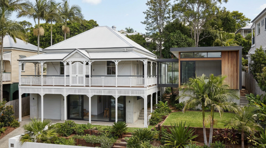 Quorum Studios, Brisbane residential architects — restored Paddington Queenslander with ornate white verandah and contemporary glass and timber rear addition
