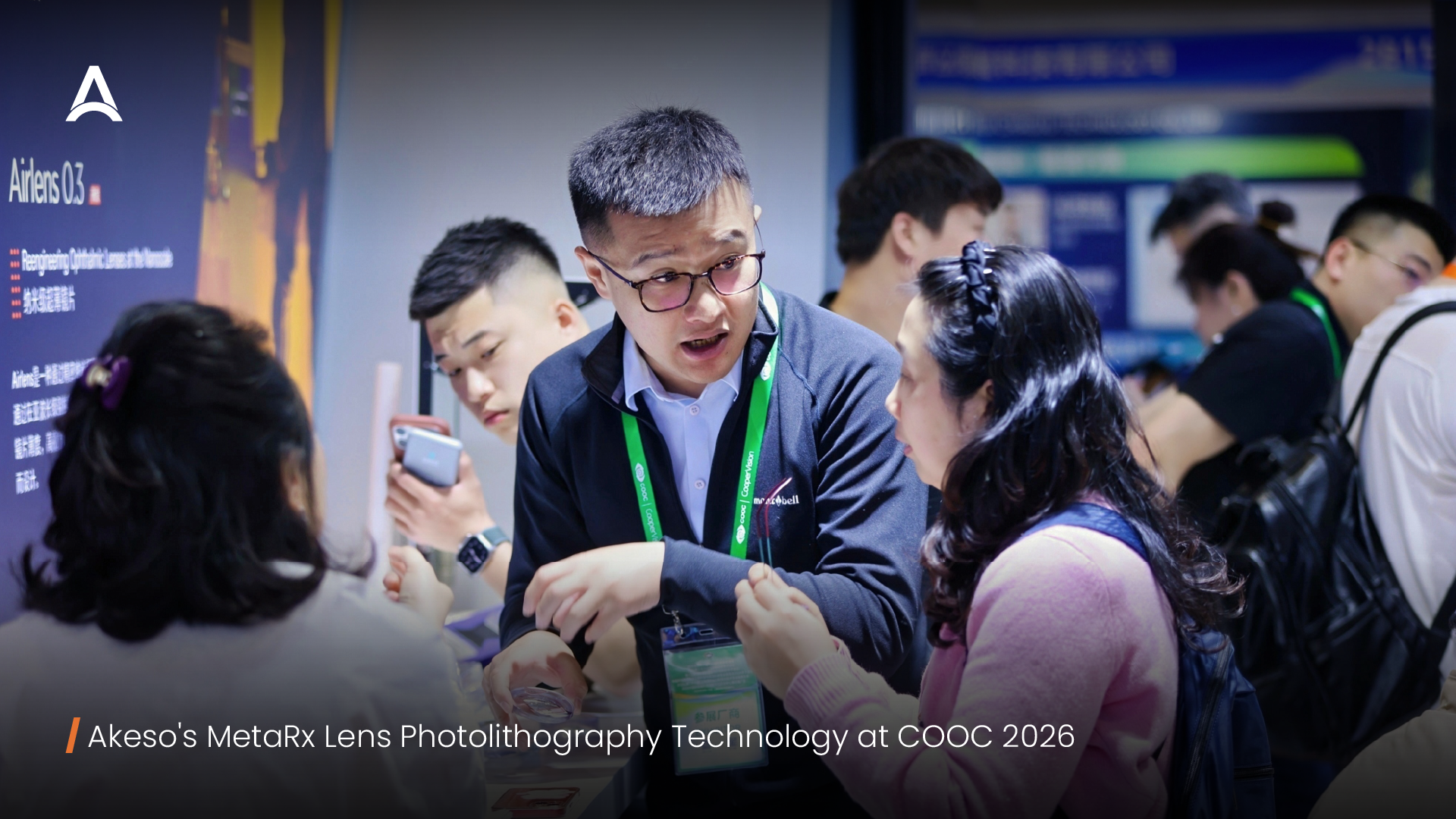 Dr. Cai Xiaogu (CEO & Founder, Akeso) discussing personalised myopia management solutions with visitors