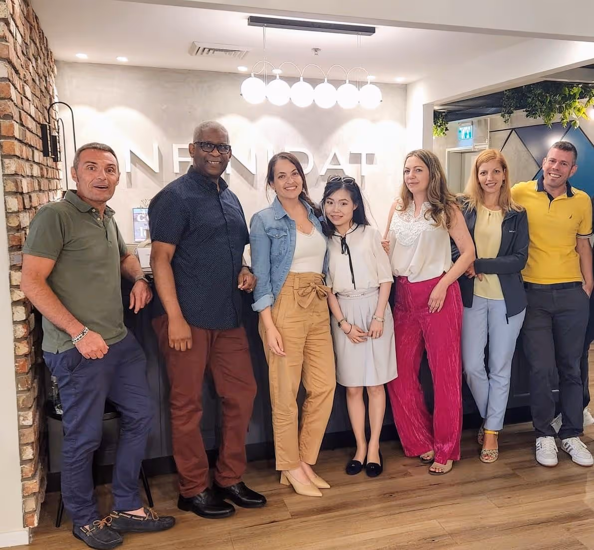 A group of people posing for a photoAI-generated content may be incorrect.