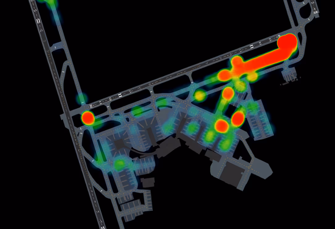 A green and orange glowing map of an airport.
