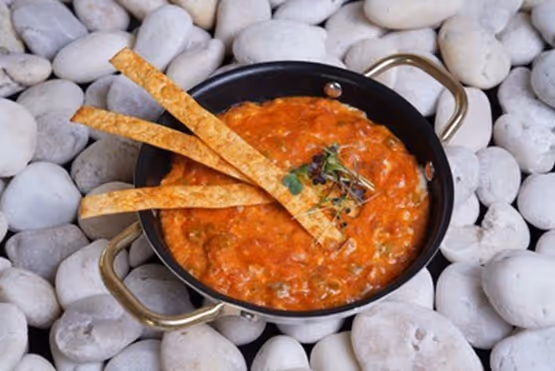 Menemen served on a traditional Turkish plate