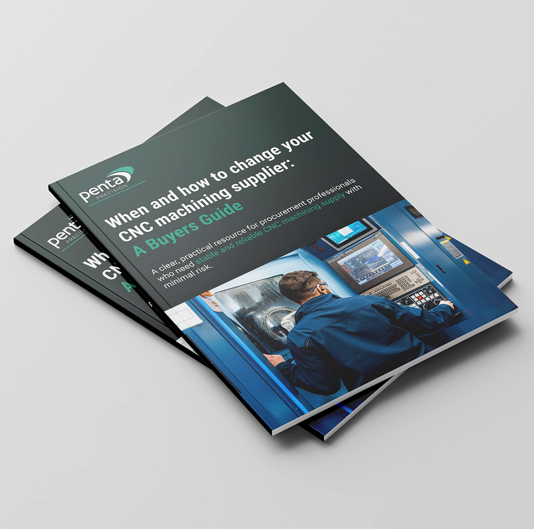 Stack of brochure covers for the Changing CNC Machining Suppliers Guide, promoting a free downloadable ebook.