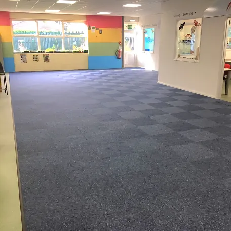 A room with checkered blue floor tiles.