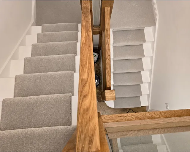 A set of stairs leading up to a second floor.