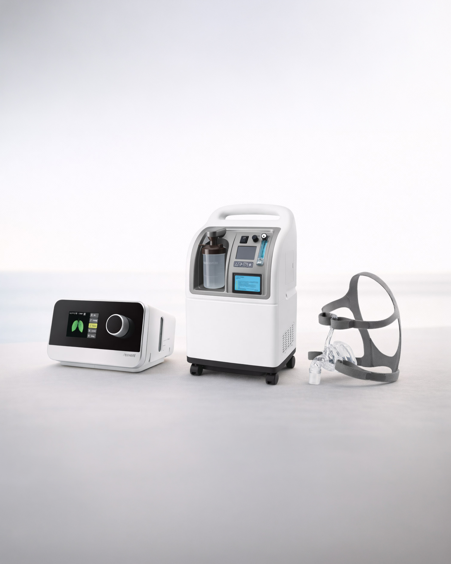 Portable medical ventilator machine with control panel, oxygen humidifier bottle, and headgear with breathing mask.