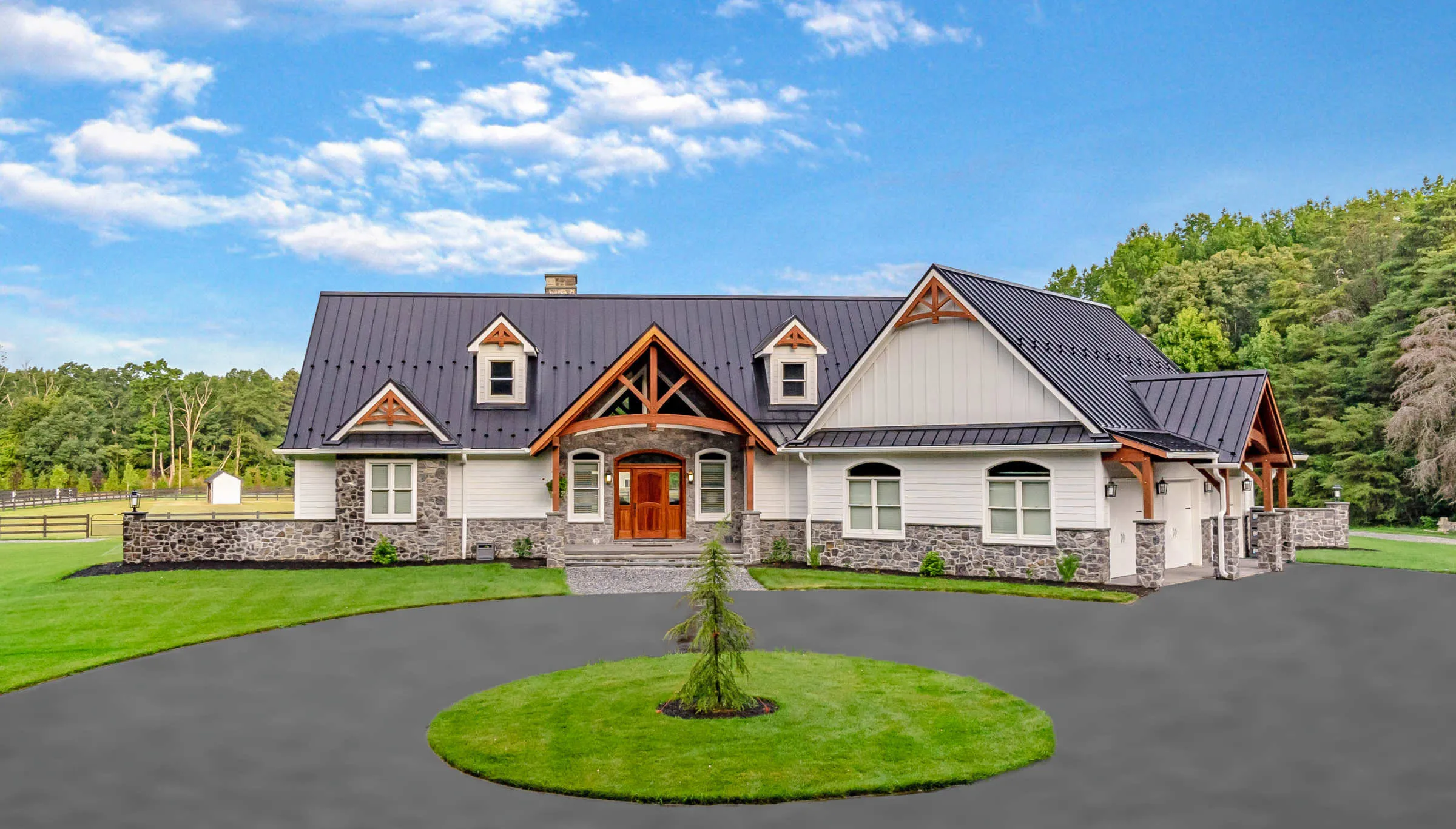 Custom timber frame home with attached garage.