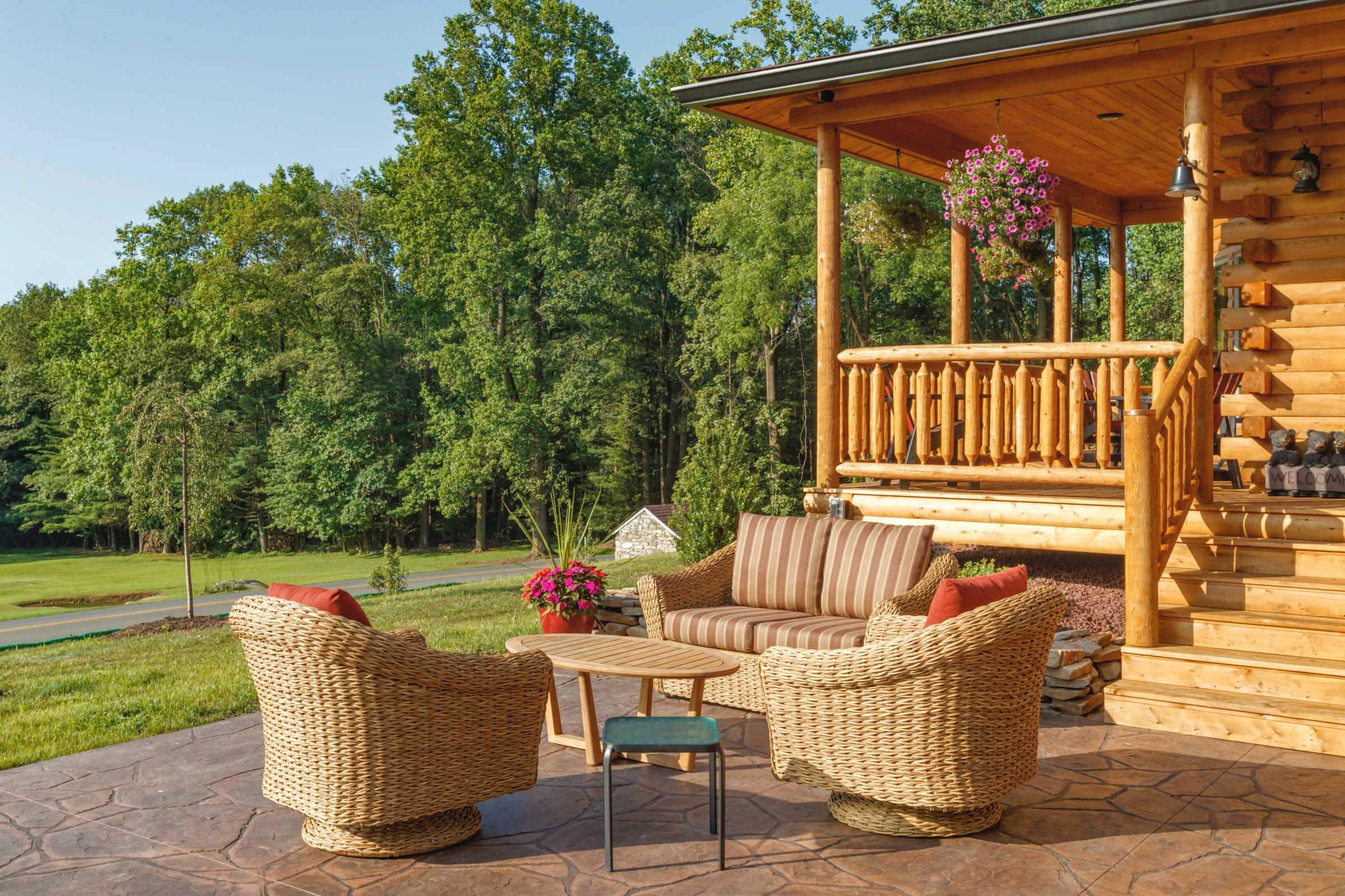 Patio with Stamped Concrete by Log Home