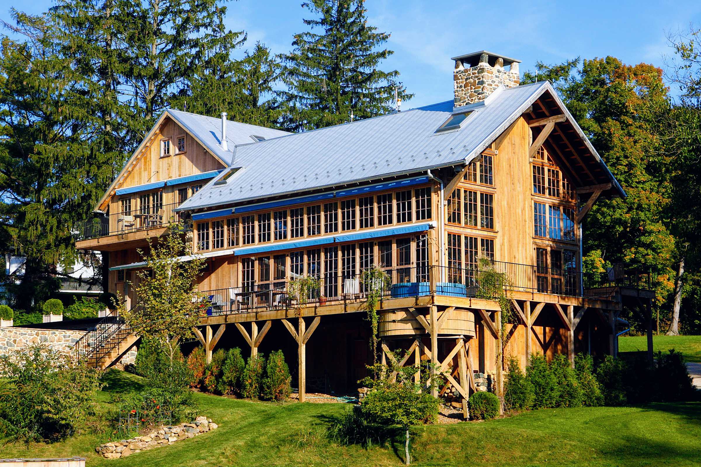 Converted barn house with large timber frame addition.