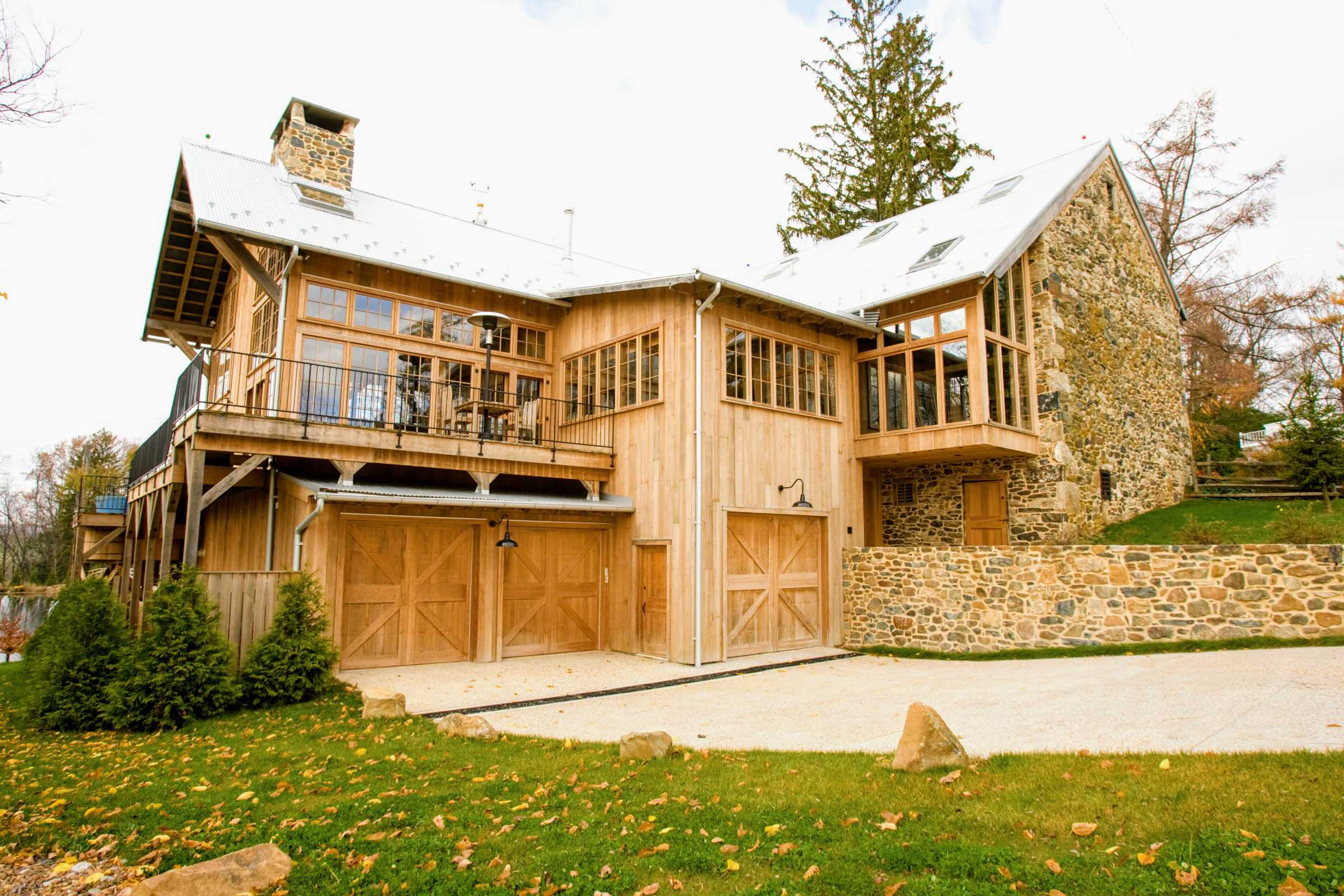 Garage under barn home with heated driveway.