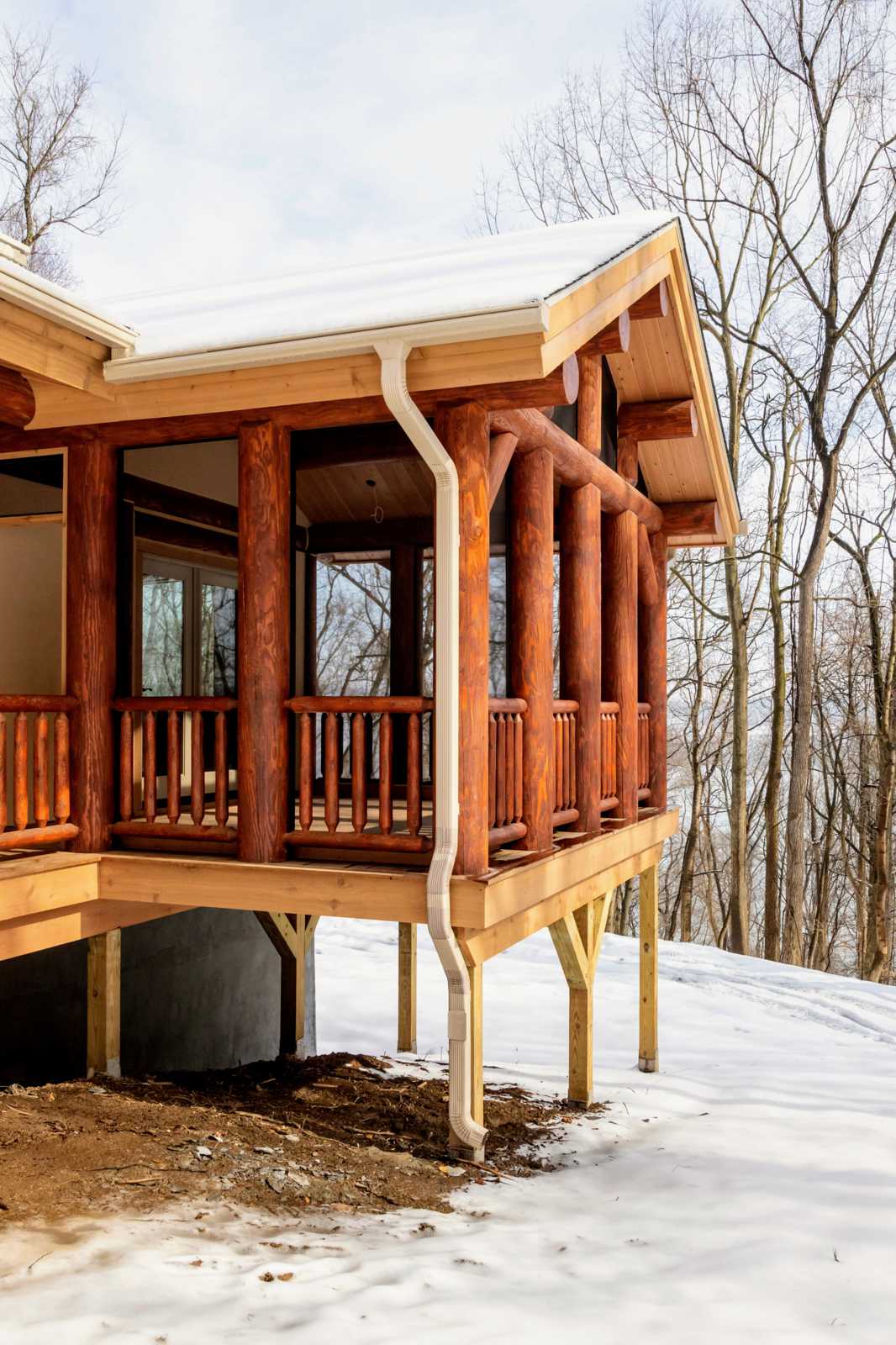 Exterior view of porch on post and beam house.