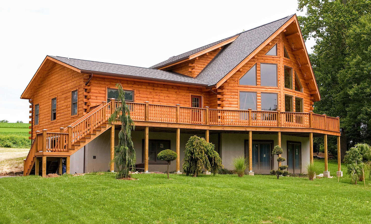 Log home with wrap around porch.