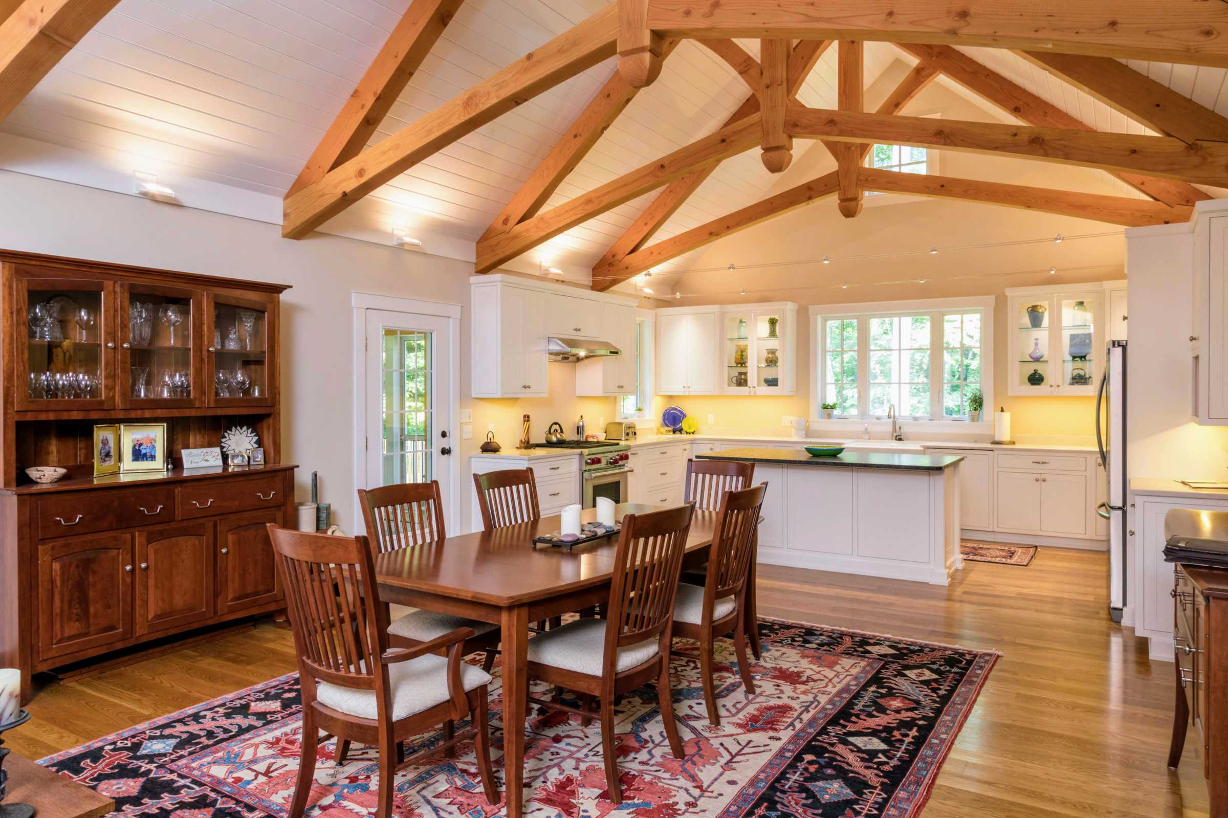 Exposed timber framing in the dining area and kitchen offer warmth and appeal.
