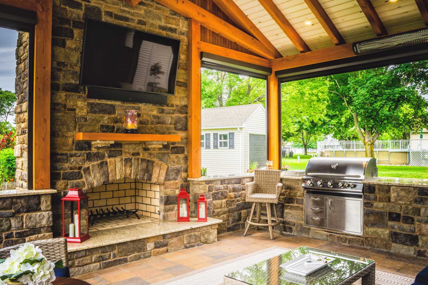 interior outdoor living area and outdoor kitchen.