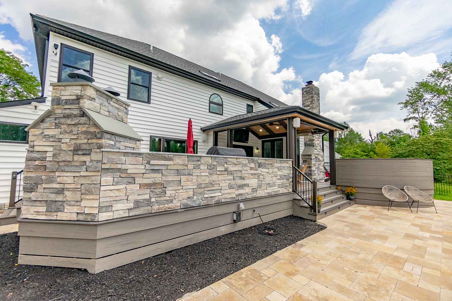 Unique custom deck with beautiful stone work