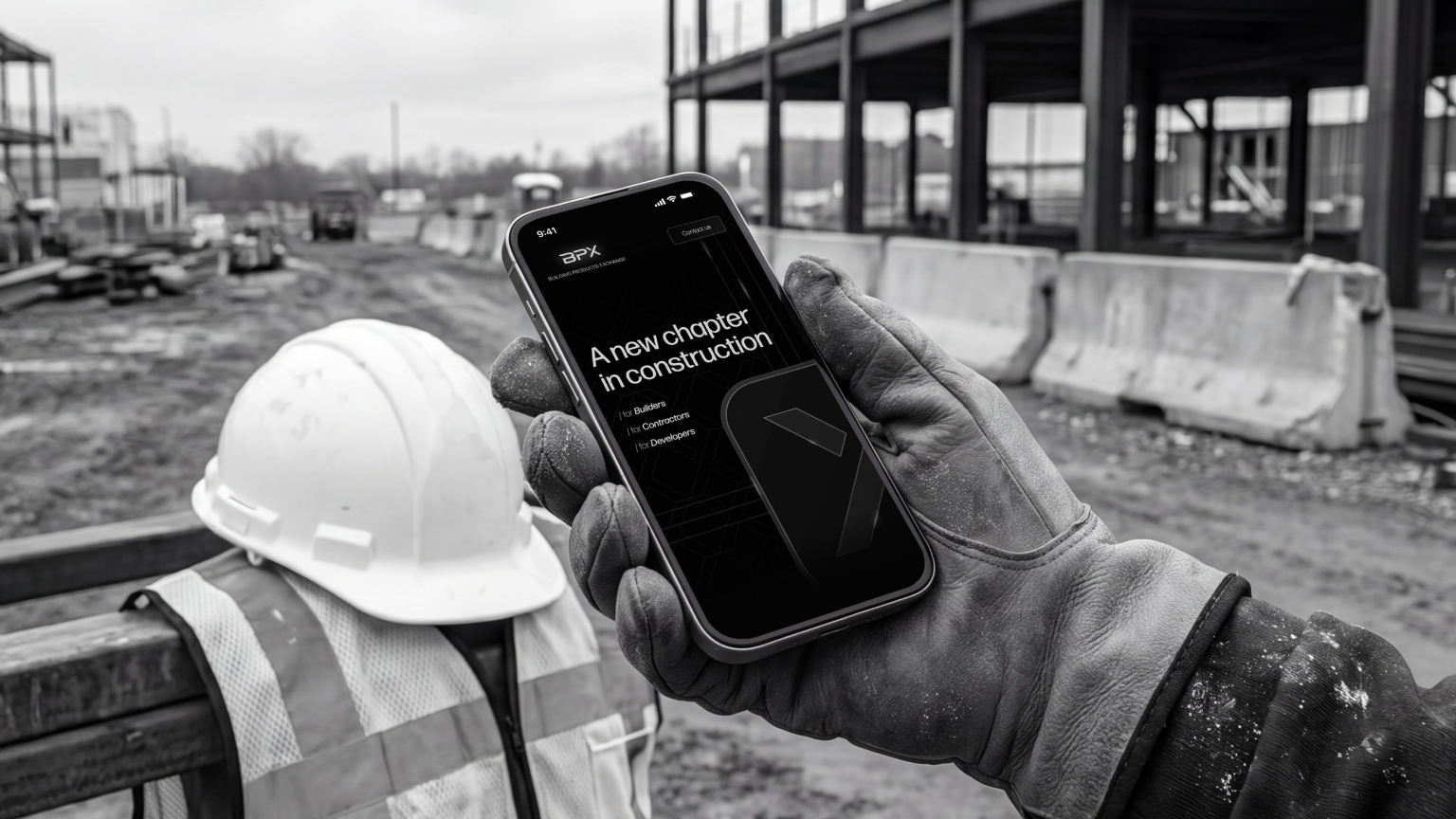 BPX website designed by knsy shown on a mobile device held by a construction worker