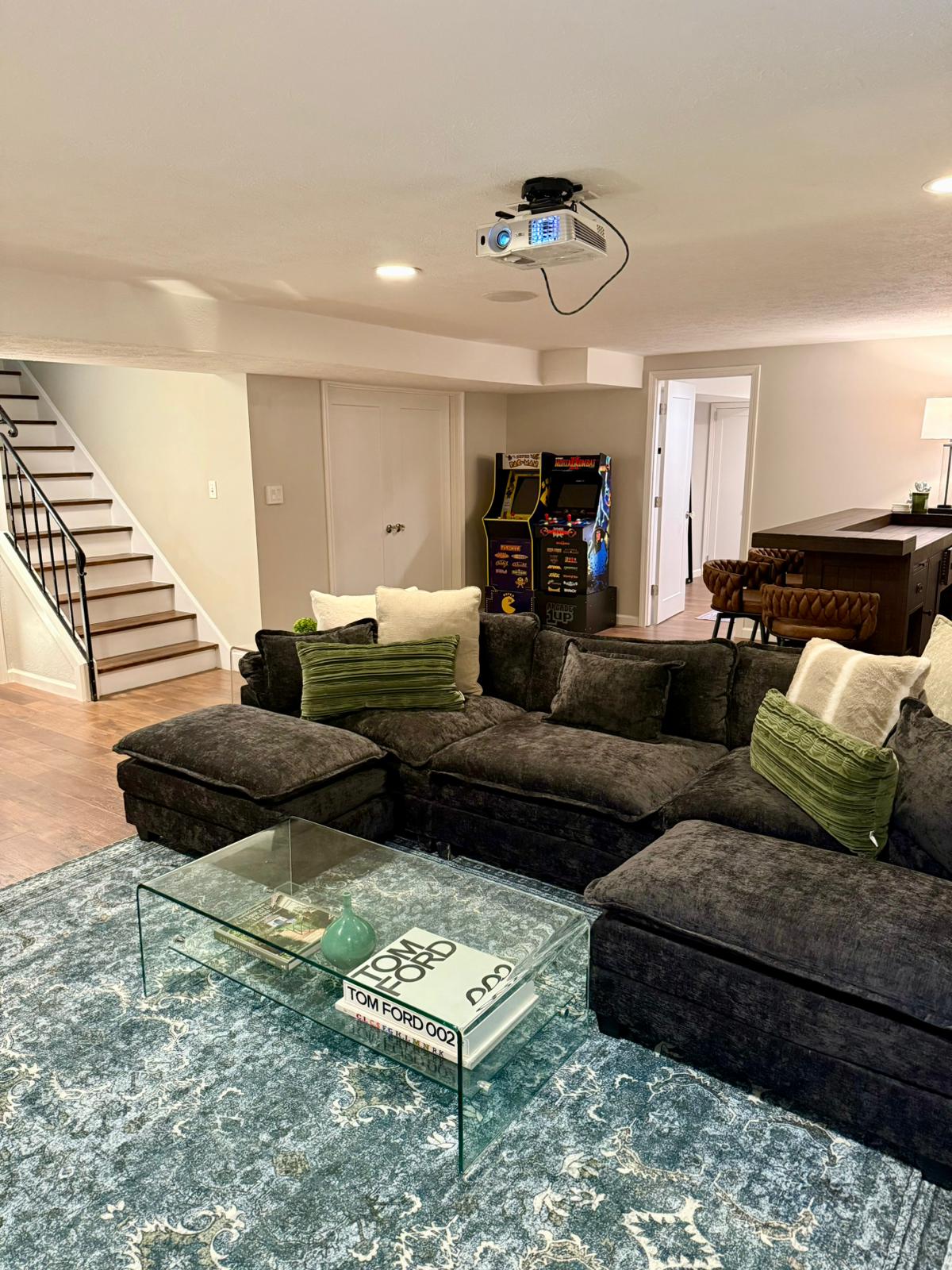 After — staircase into finished basement lounge in Pepper Pike, OH — Manzil