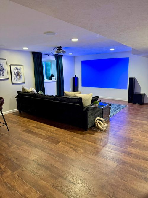 After — basement lounge with LED accent lighting in Pepper Pike, OH — Manzil