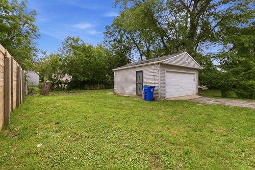 After — renovated house exterior — Manzil