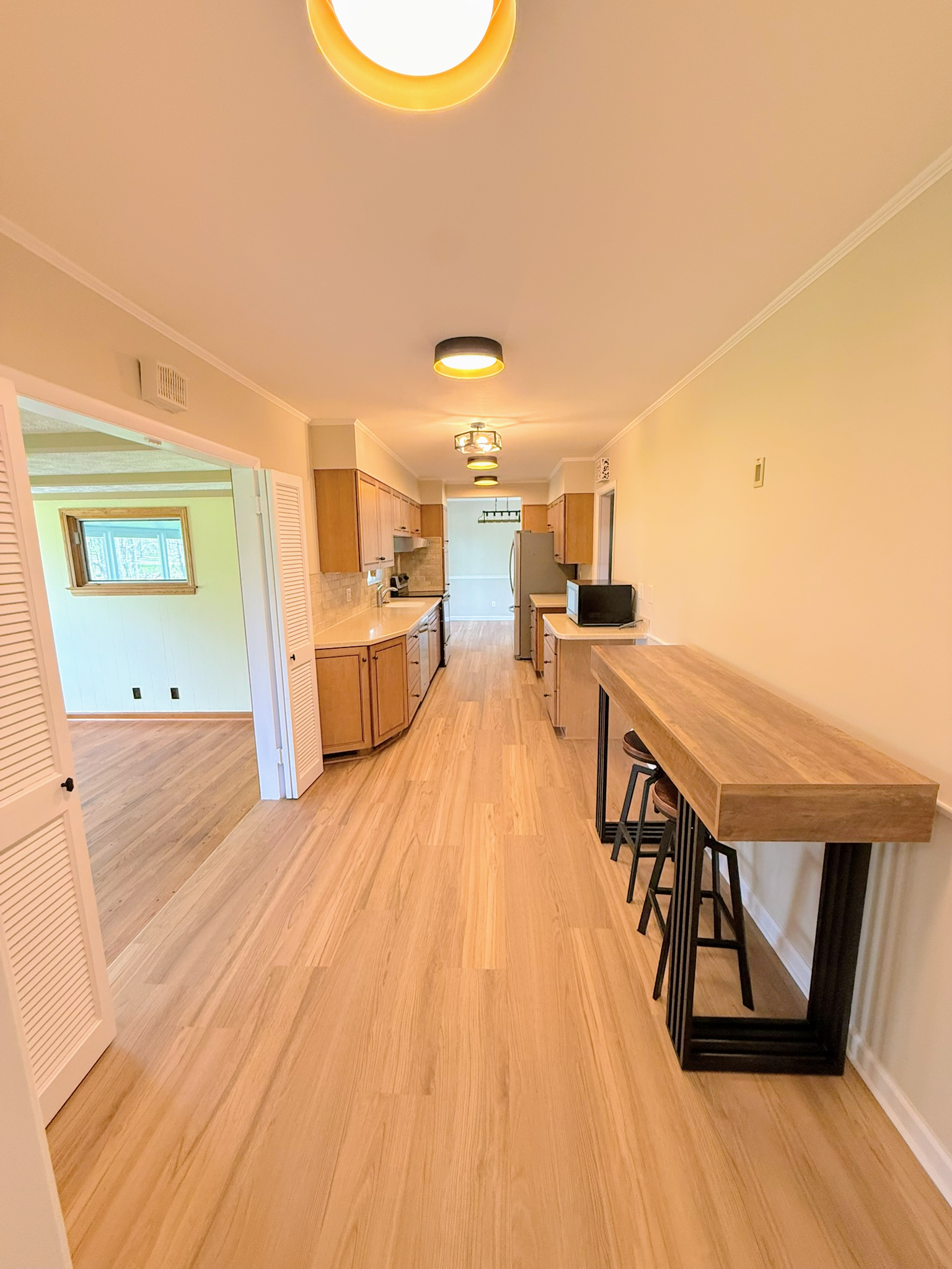 Renovated kitchen with new cabinetry and work surfaces in a Cleveland ranch