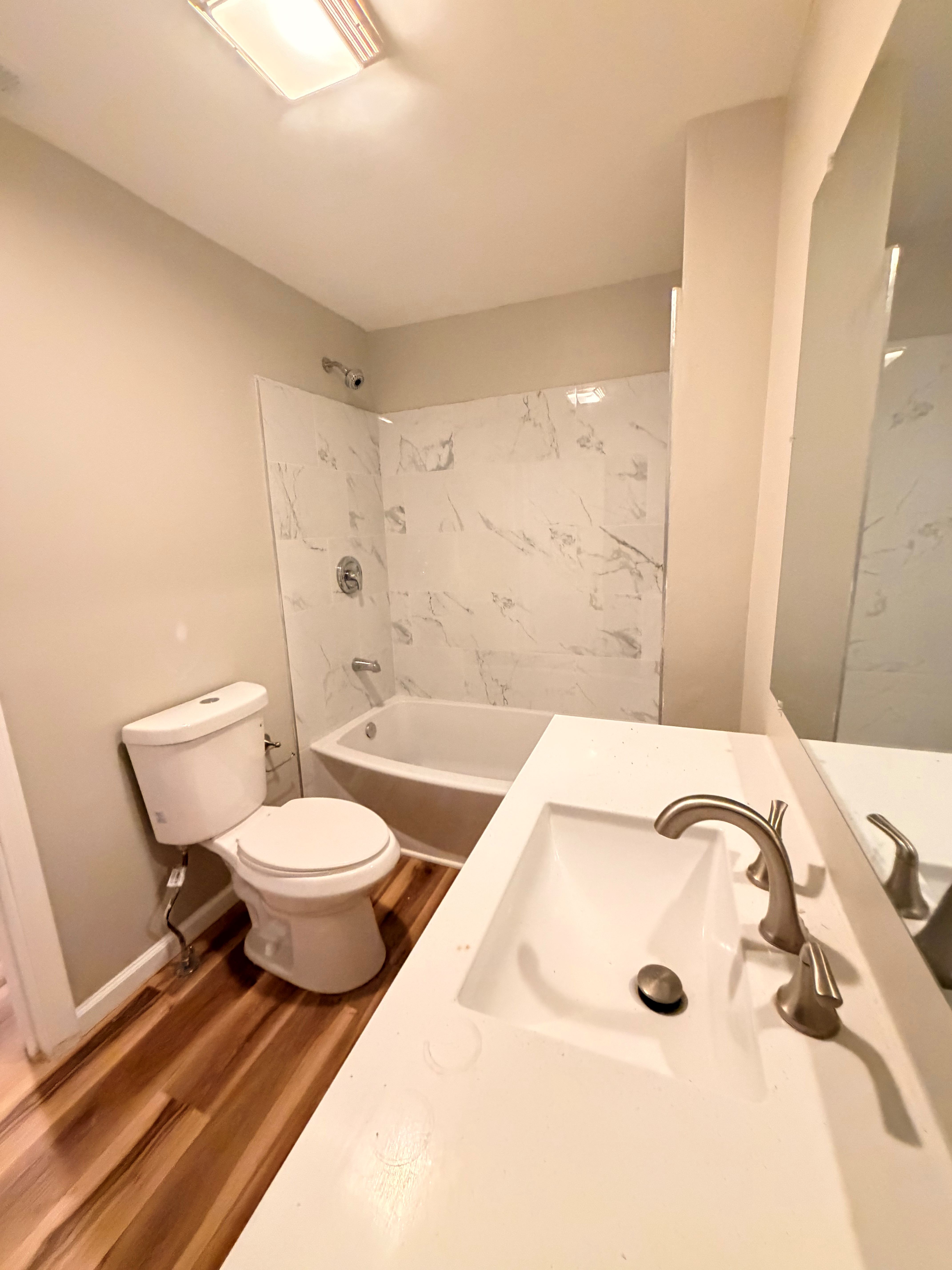 After — bathroom vanity and fixtures after renovation in North Ridgeville, OH — Manzil Renovation