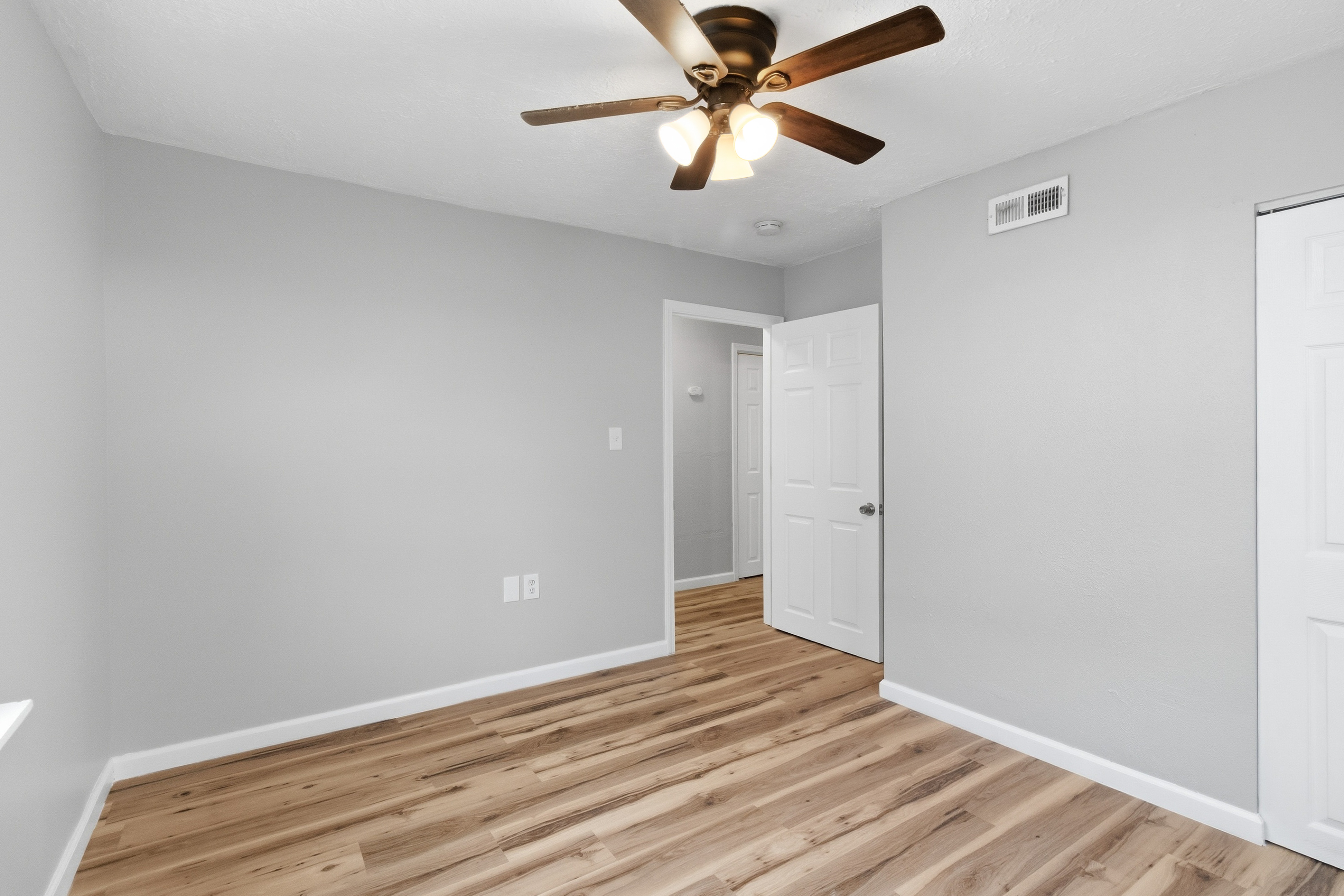 After — bedroom with hallway view in North Ridgeville, OH — Manzil Renovation