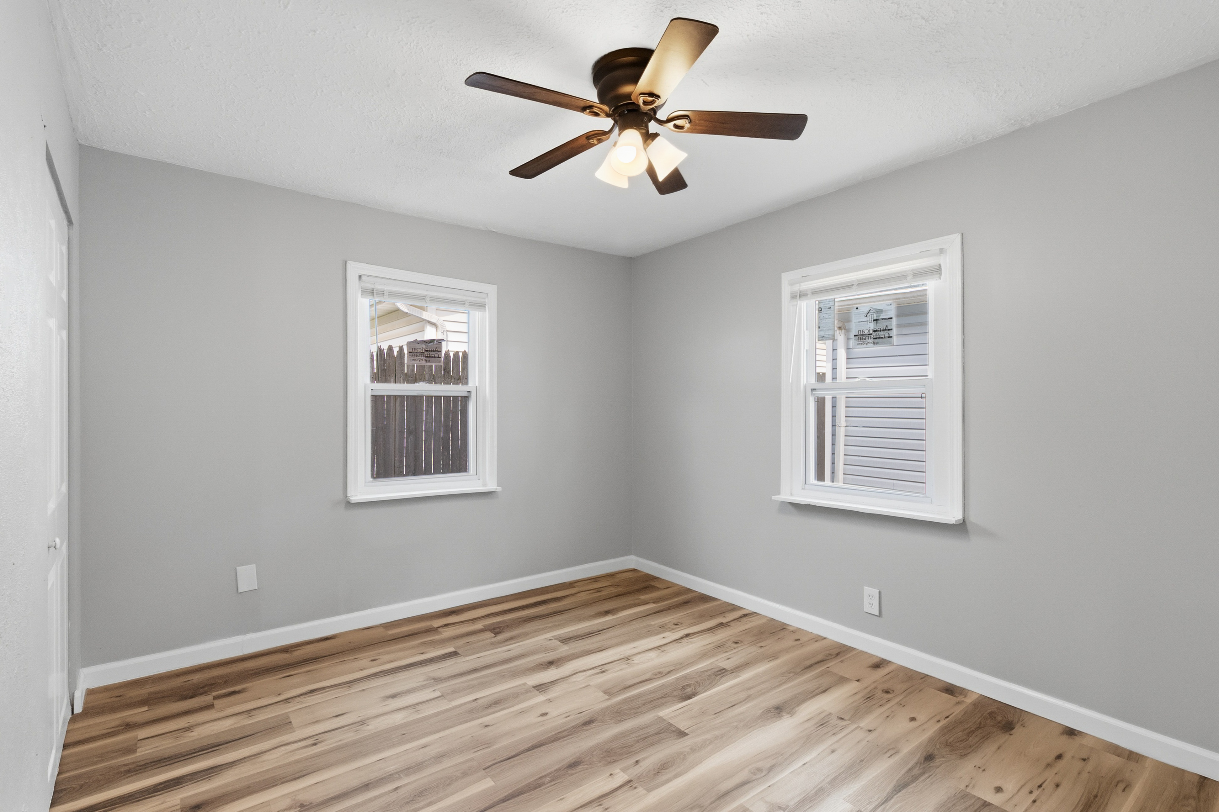 After — bedroom with new windows in North Ridgeville, OH — Manzil Renovation