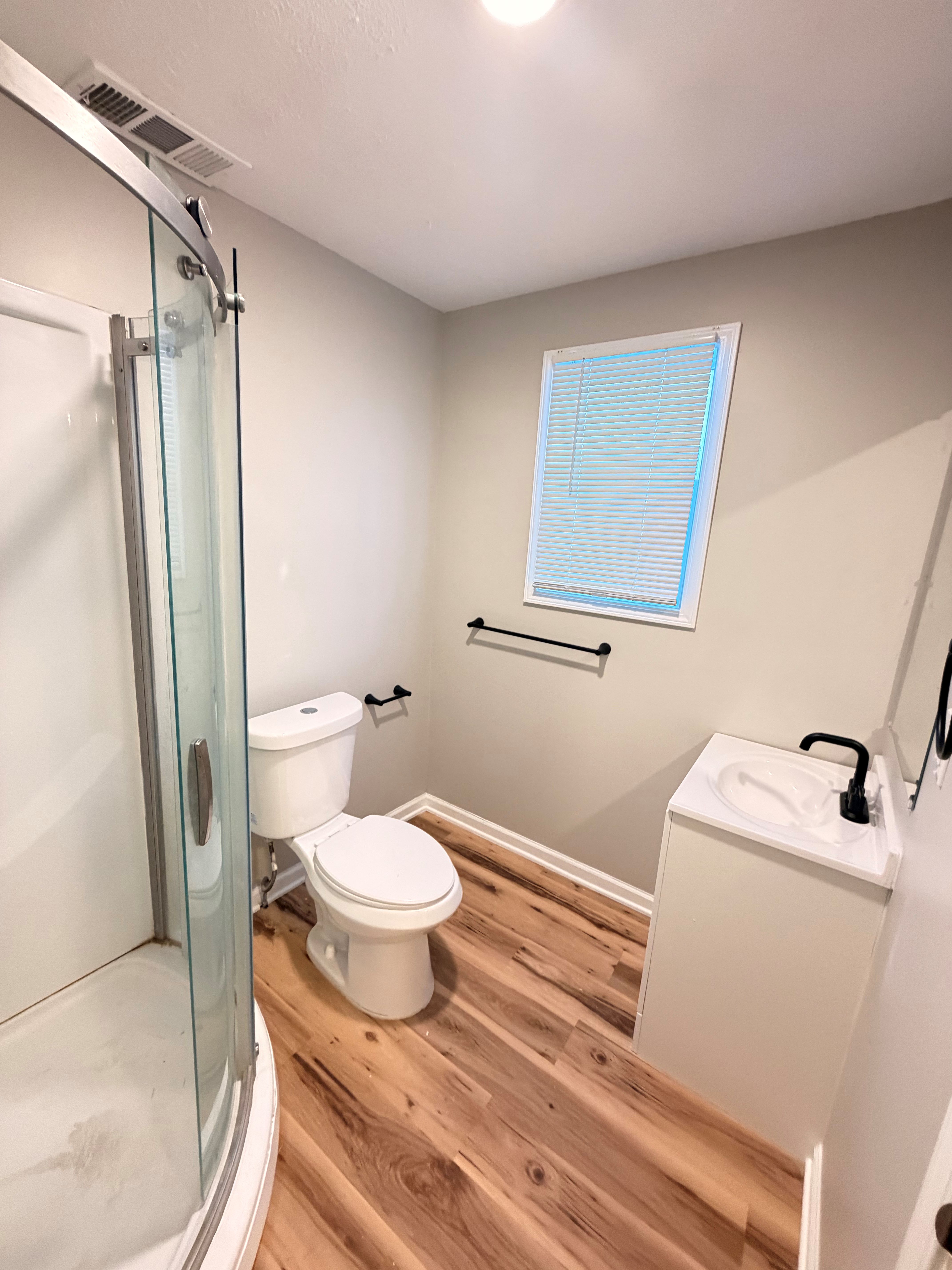After — second updated bathroom with new fixtures in North Ridgeville, OH — Manzil Renovation
