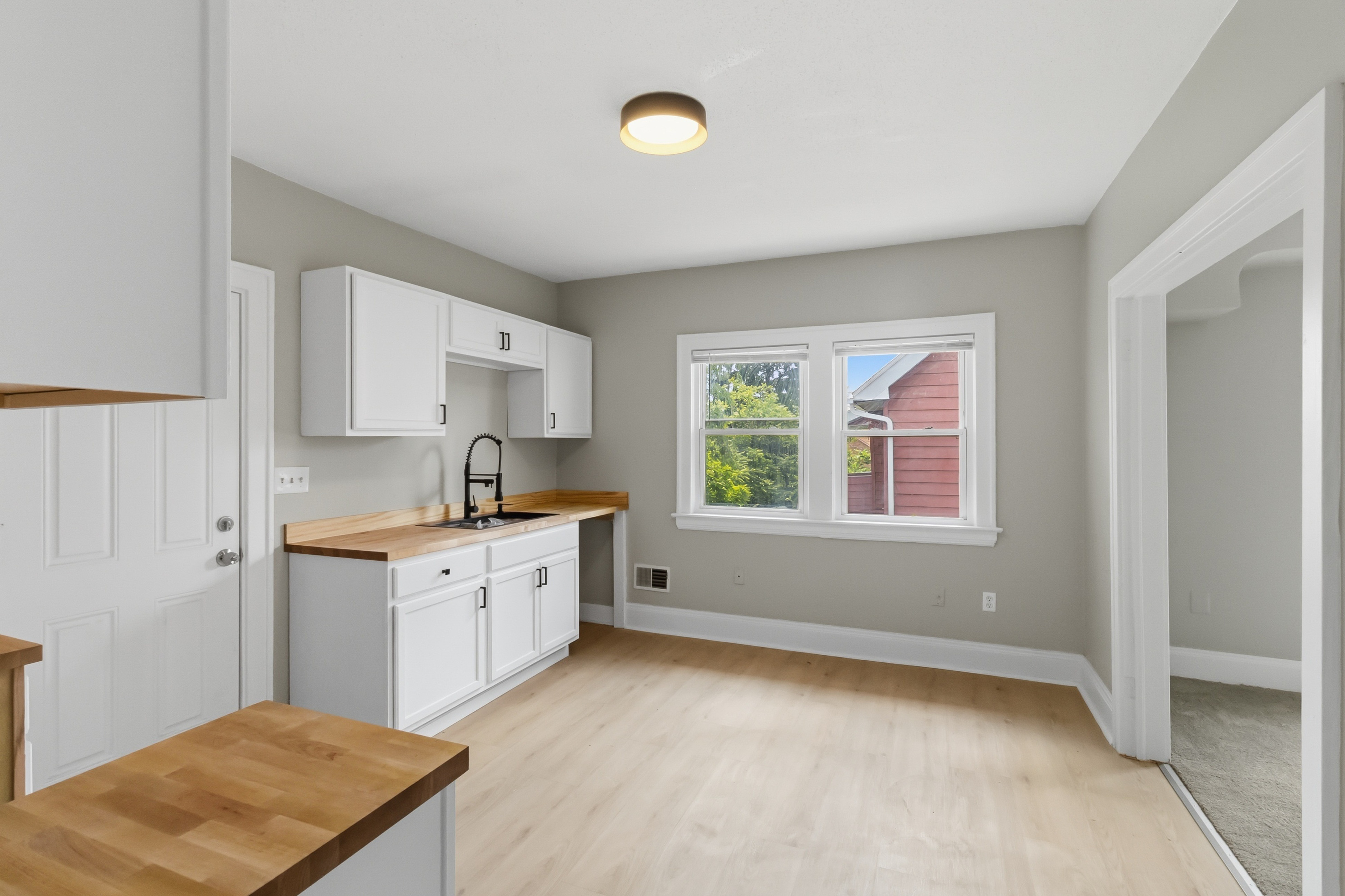 After — finished kitchen after whole-home renovation — Manzil Renovation