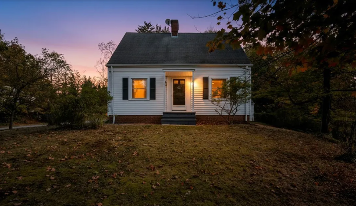 Renovated home at dusk in Brecksville, OH — Manzil Renovation