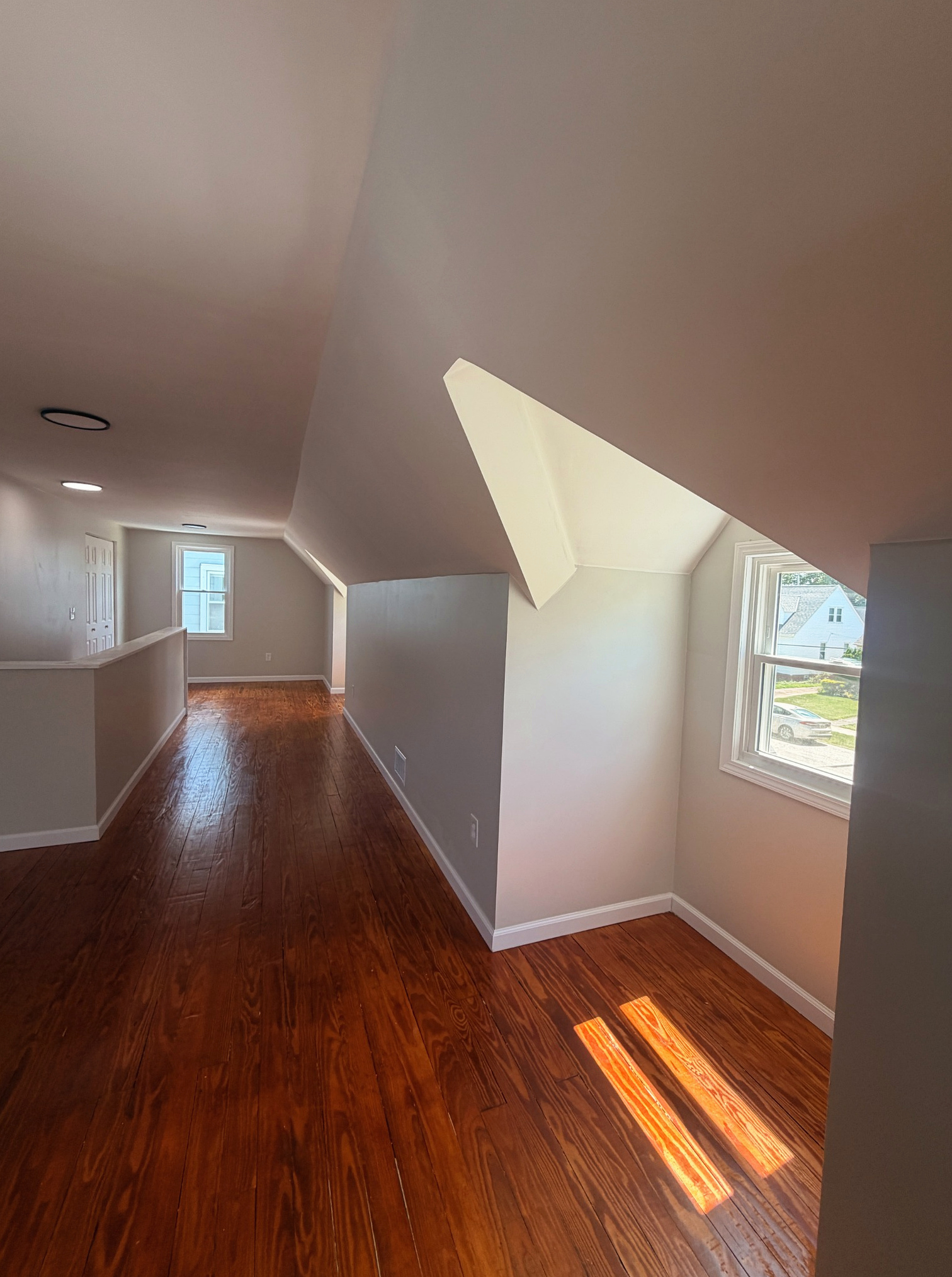 Finished attic loft, view 1 of 3, Wayland Ave Cleveland renovation